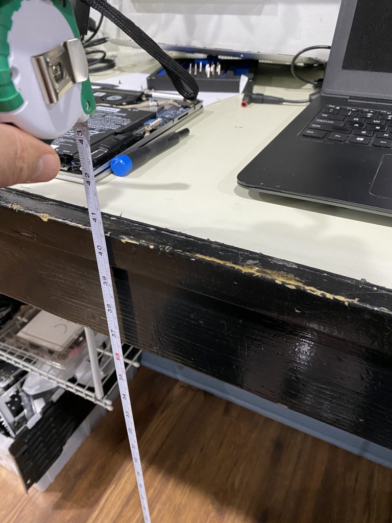 Measuring height of Workbench at Click IT Headquarters